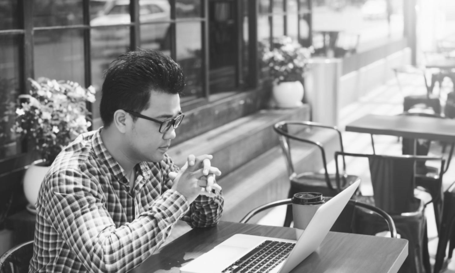 Students collaboratively reviewing code during practical workshop session